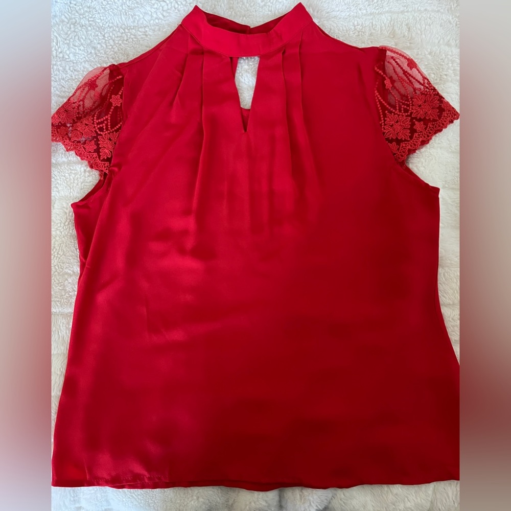 Red women’s blouse with lace detail size L